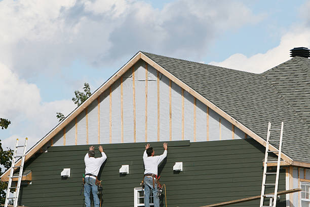 Professional Storm Damage Siding Repair technician working in Plainfield, IL